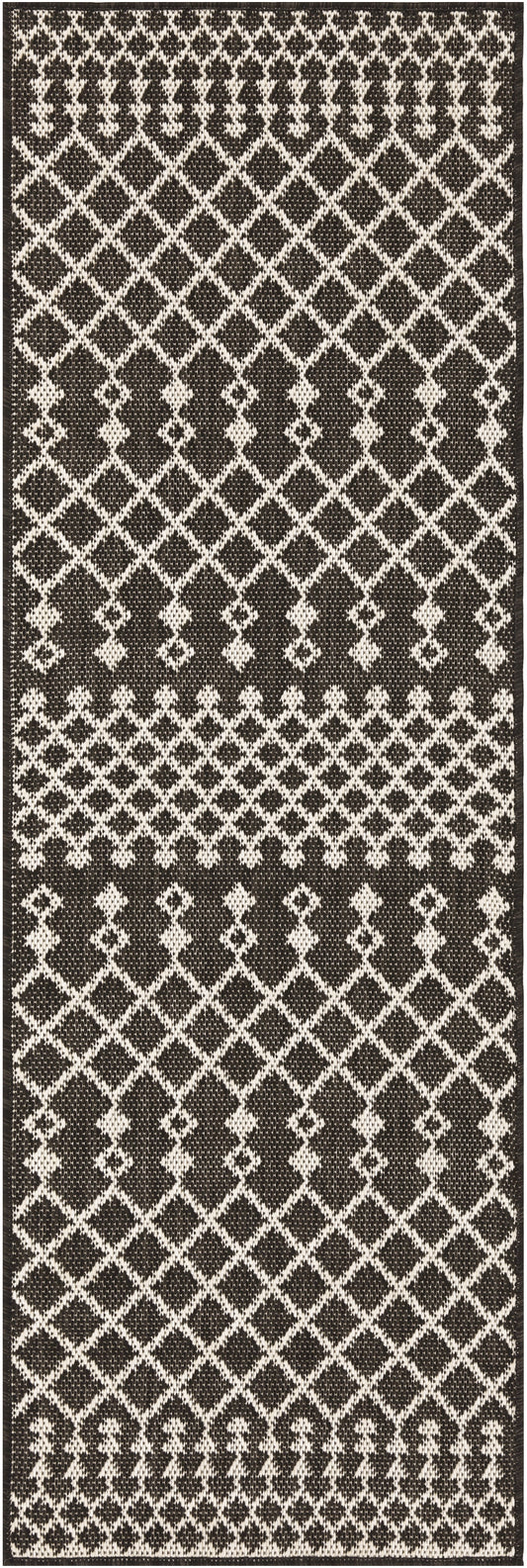 Long black-and-white woven runner with geometric diamond lattice pattern and decorative end border.