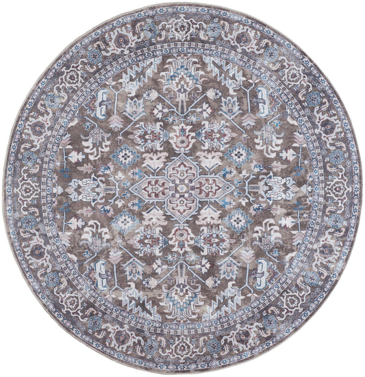 Round woven rug with taupe base, ivory and blue floral medallion and ornate border.
