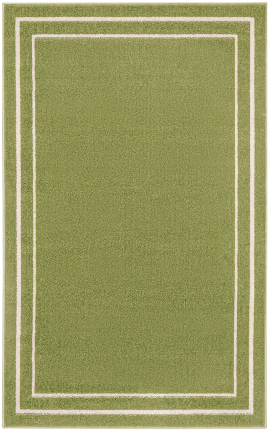 Green rectangular rug with cream double-frame borders and soft textured pile.