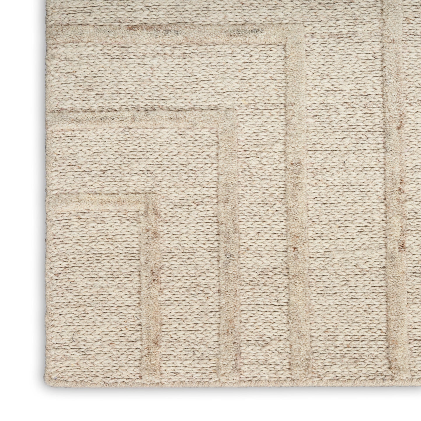Beige woven rug with geometric rectangular block pattern, textured loop pile, ideal for living room decor.