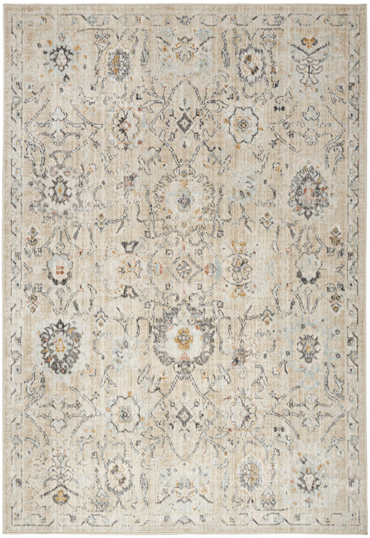 Beige vintage-style oriental rug with faded blue & gray & gold floral medallions, distressed look, bordered edges.