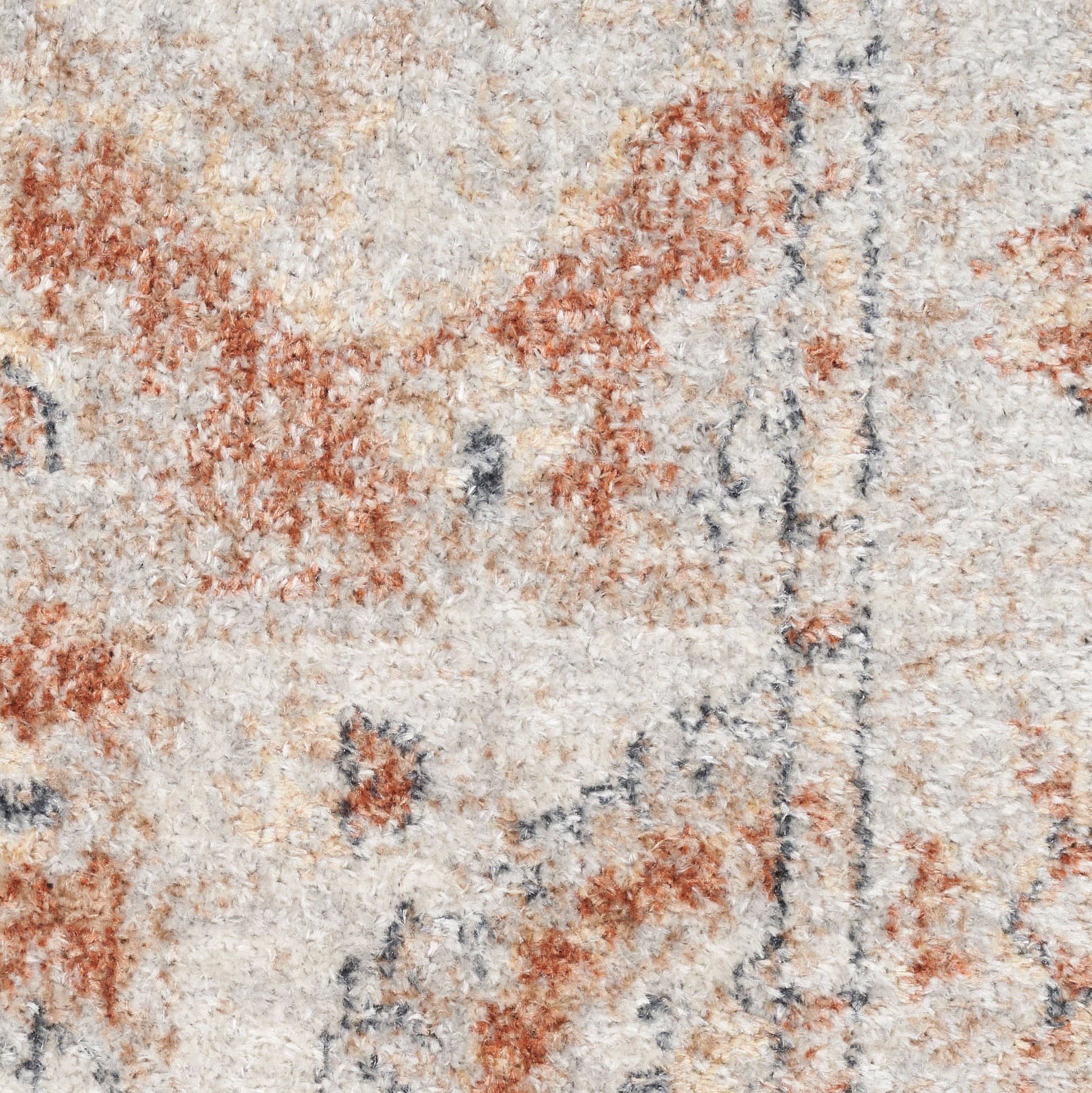 Cream shag rug with rust orange and blue-gray abstract pattern; plush, textured pile for living room.