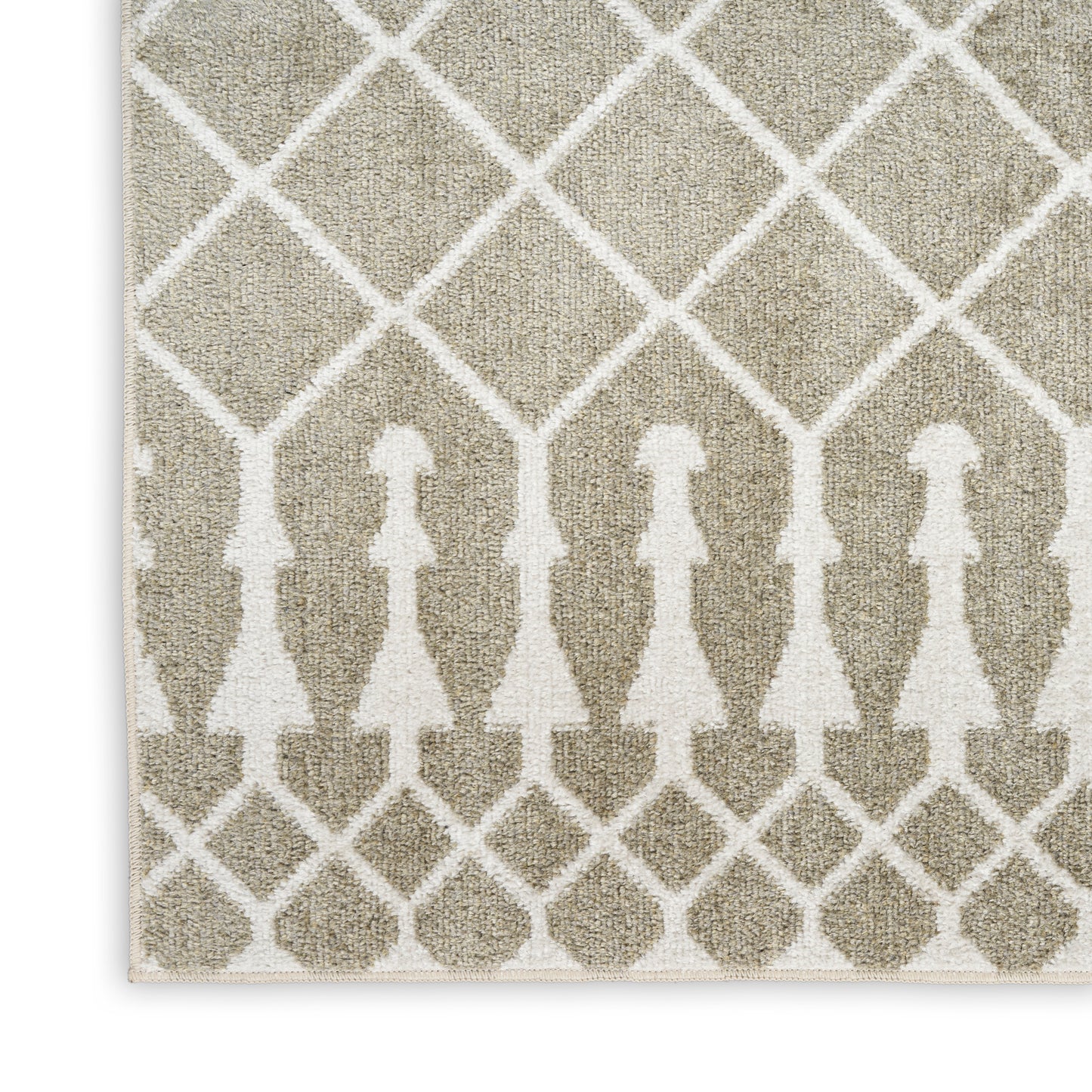 Beige area rug with white lattice pattern and row of abstract human silhouettes; woven texture, geometric decor.