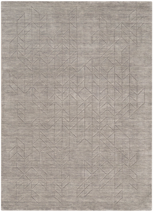 Neutral gray-beige area rug with a subtle geometric triangular line pattern for a modern, minimalist look.
