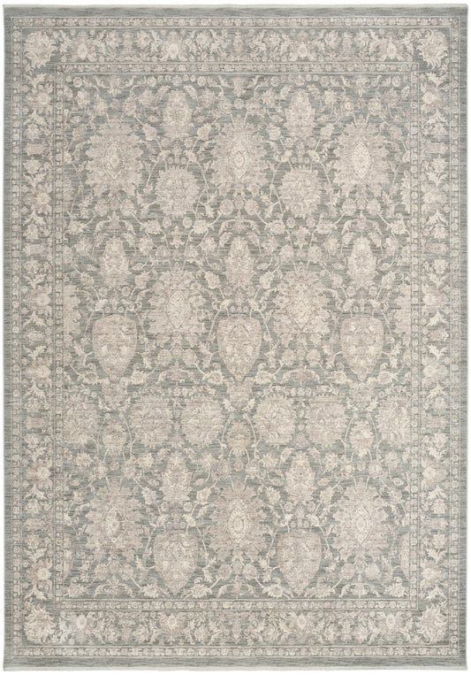 Gray-blue oriental rug with cream floral damask pattern and layered decorative borders.