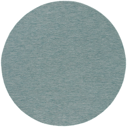 Round teal-blue rug with a subtle quilted diamond grid pattern and soft textured surface.