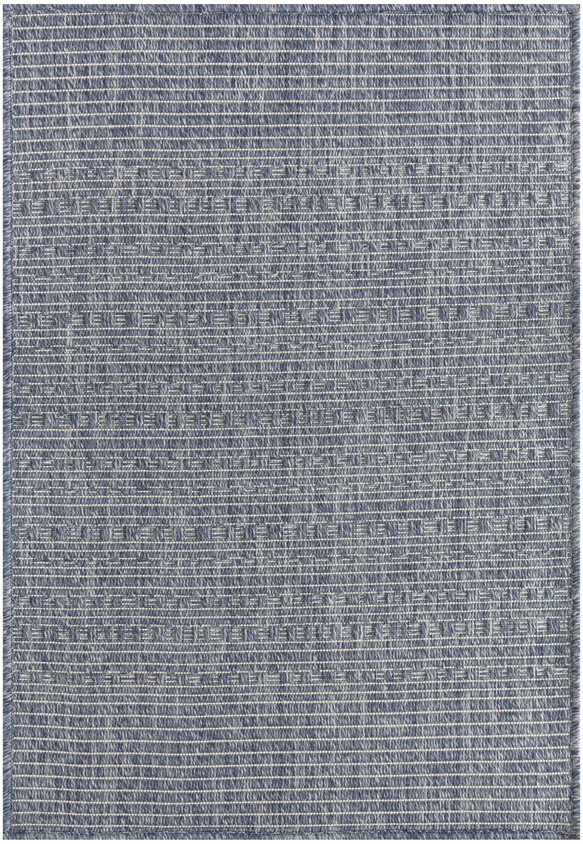 Denim blue flat-weave rug with subtle horizontal stripes; rectangular outdoor rug