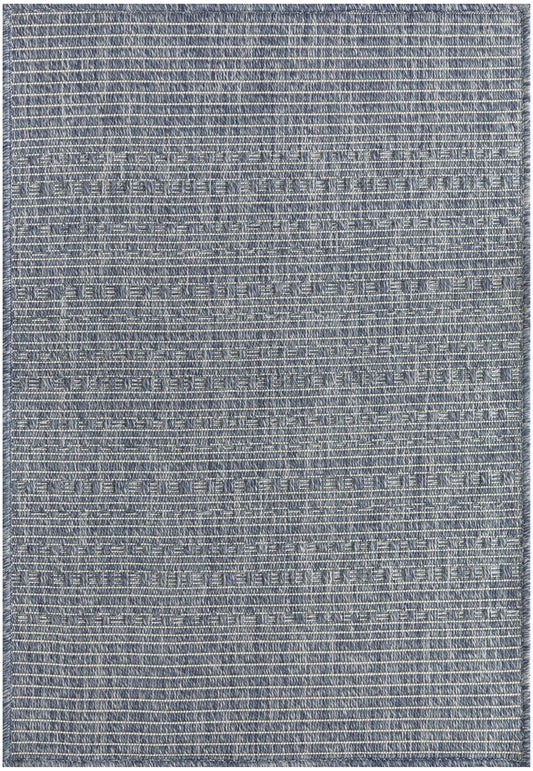 Denim blue flat-weave rug with subtle horizontal stripes; rectangular outdoor rug