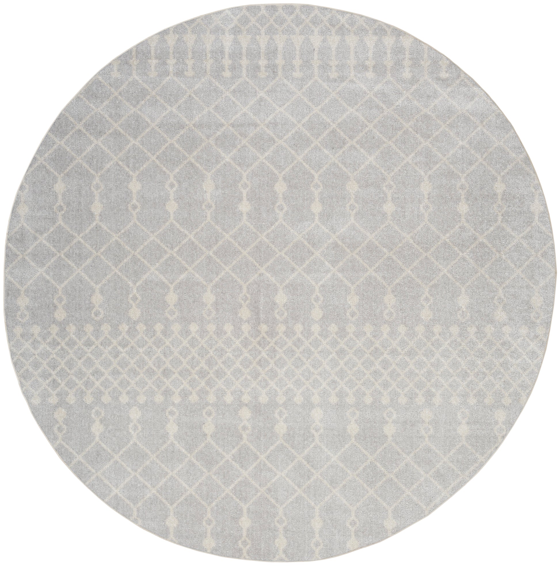 Round gray rug with white geometric lattice pattern; modern, textured, low-pile style.