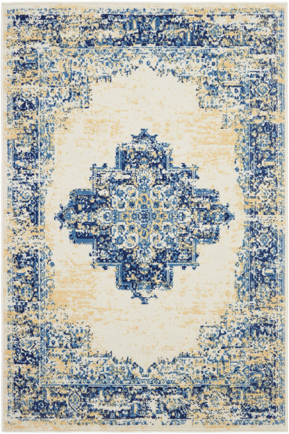 Distressed blue and cream oriental area rug with vintage central medallion and ornate border.