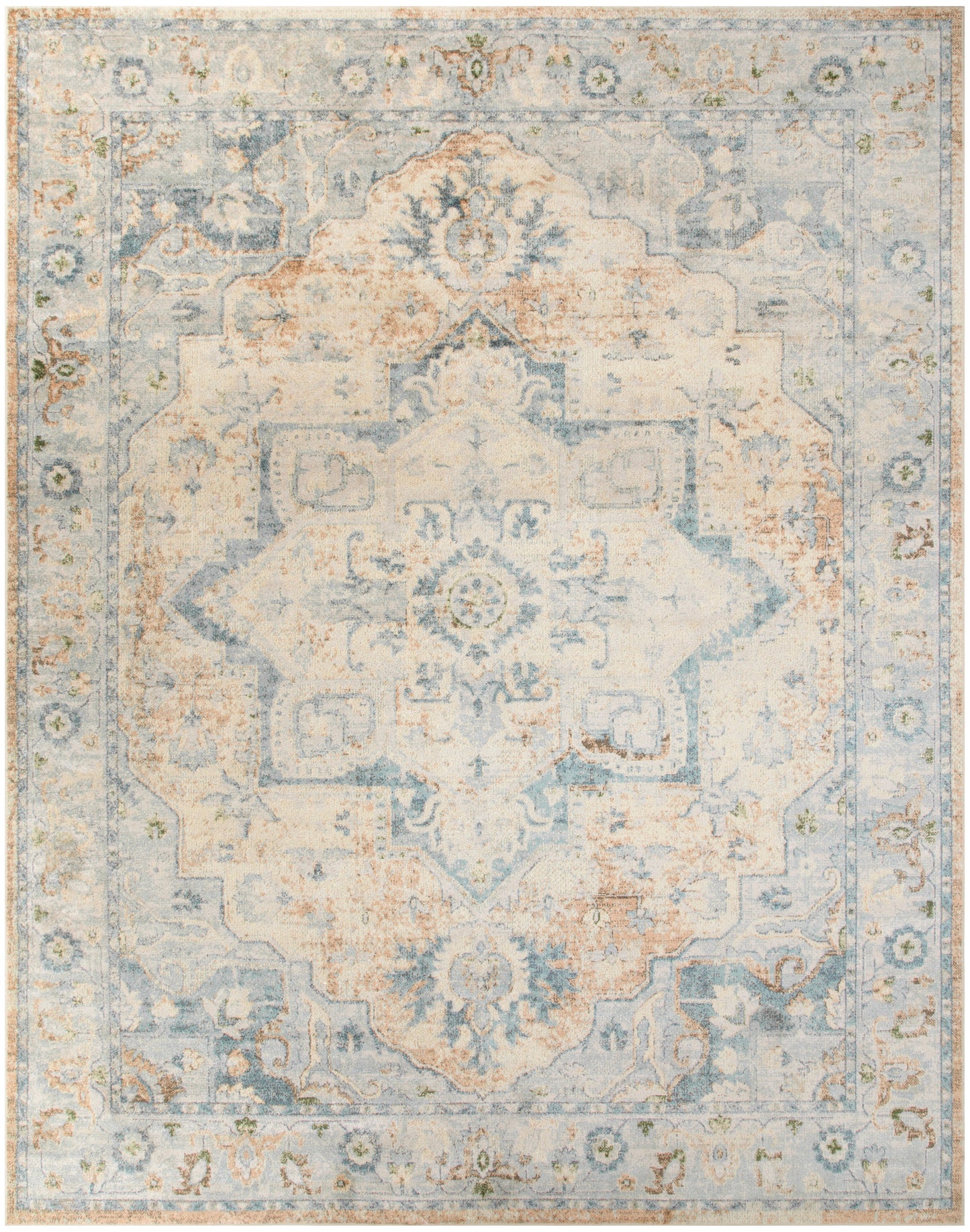 Distressed light blue oriental area rug with ivory medallion center and soft floral border.