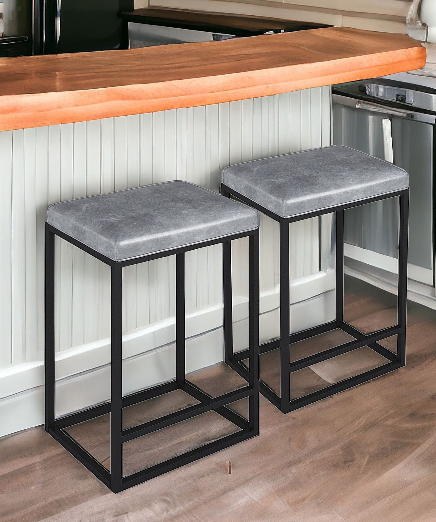 Set of Two " Gray And Black Faux Leather And Metal Backless Counter Height Bar Chairs