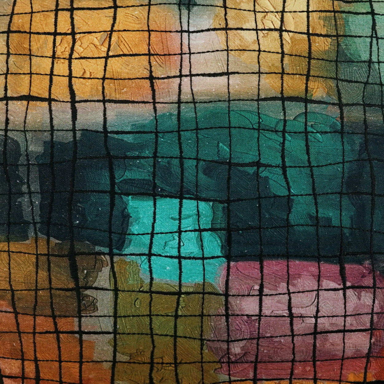 Colorful abstract fabric with a bold black grid overlay; warm yellows and oranges on top, teal middle, pink bottom.