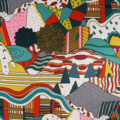 Vibrant abstract pillow pattern featuring multicolored hills, trees, waves & geometric shapes in teal, orange, pink & yellow.