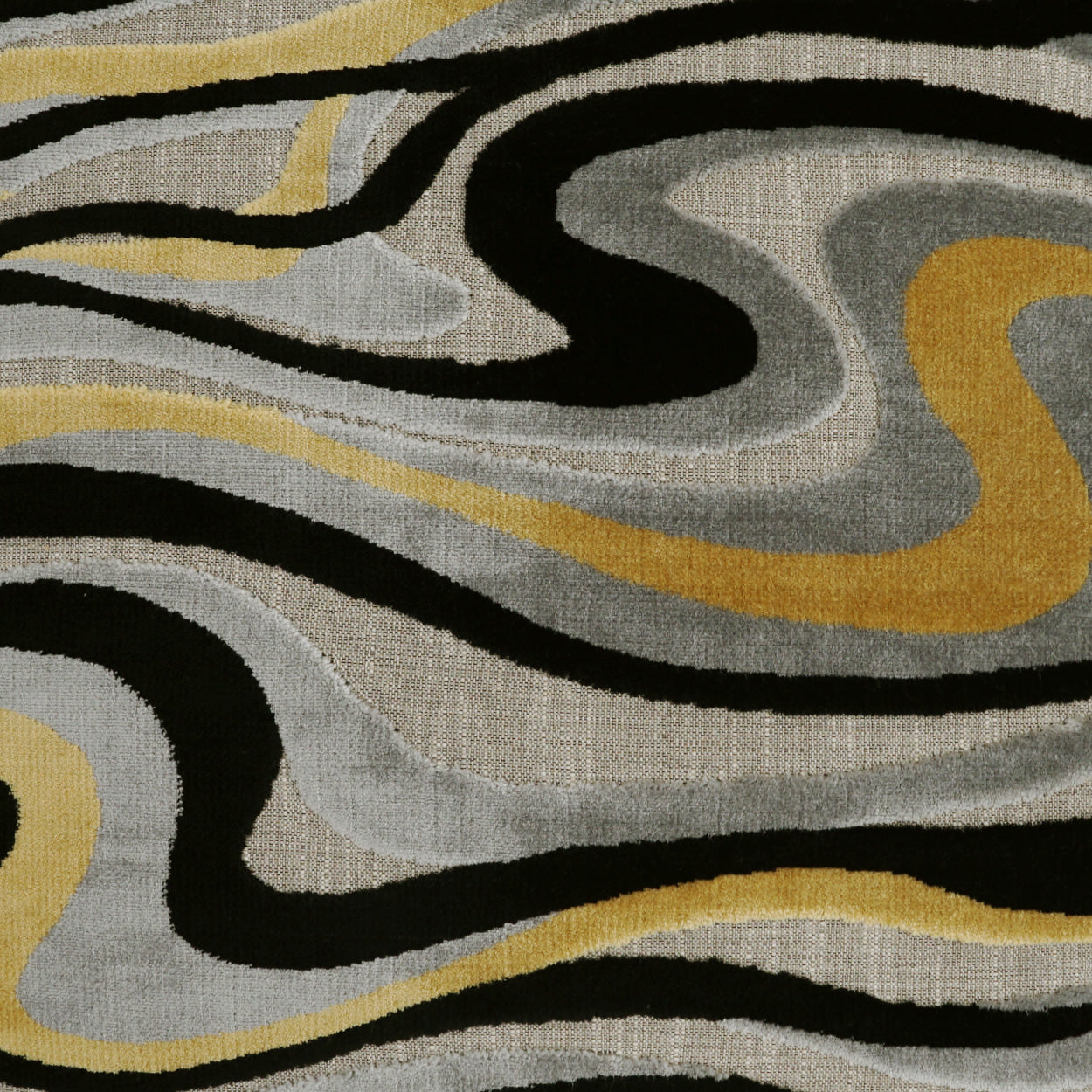 Abstract swirl-pattern rug texture in black, grey, beige and mustard yellow.