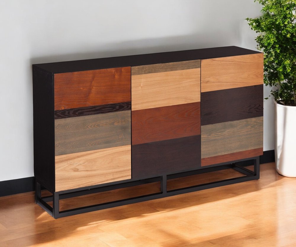 Patchwork wooden sideboard with multitone panels and black metal frame; three doors over an open lower shelf.