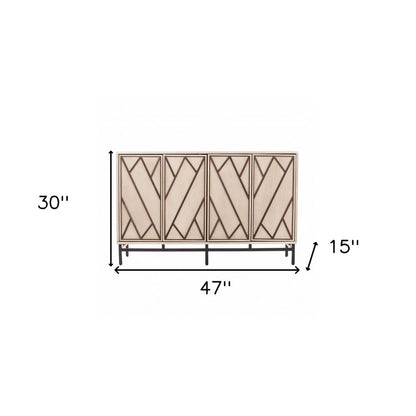 Four-door buffet storage cabinet with geometric diagonal panels, champagne finish on a black metal base, 47W x 30H x 15D.