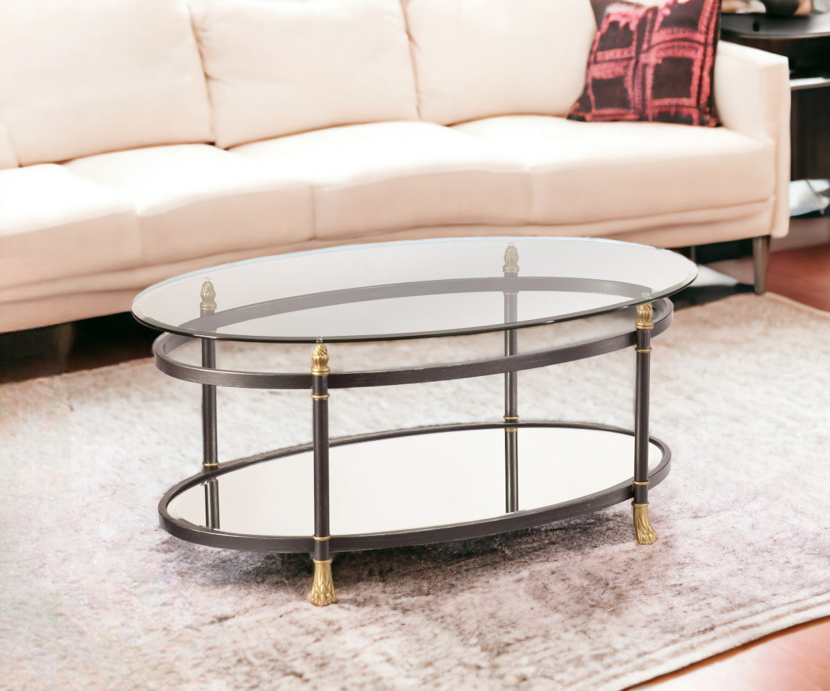 42" Gray Glass And Metal Oval Mirrored Coffee Table