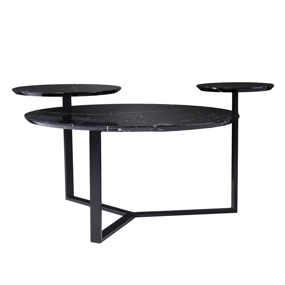 Contemporary black marble coffee table with two matching round side tables on a geometric metal frame.