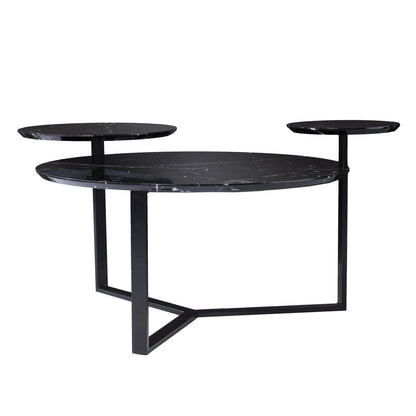 Contemporary black marble coffee table with two matching round side tables on a geometric metal frame.