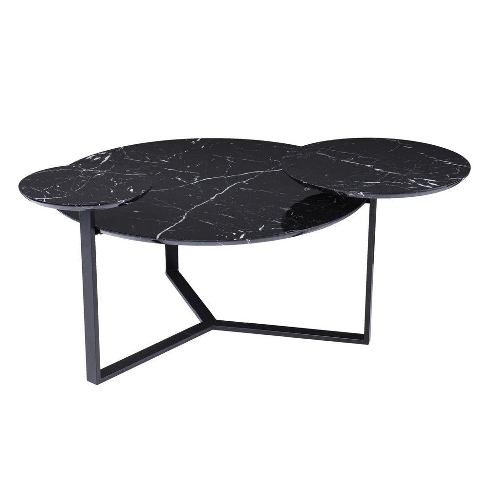 Modern three-piece nesting coffee tables with black marble tops and angular metal frames.
