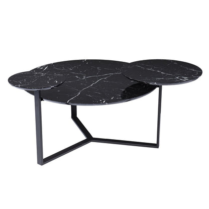 Modern three-piece nesting coffee tables with black marble tops and angular metal frames.