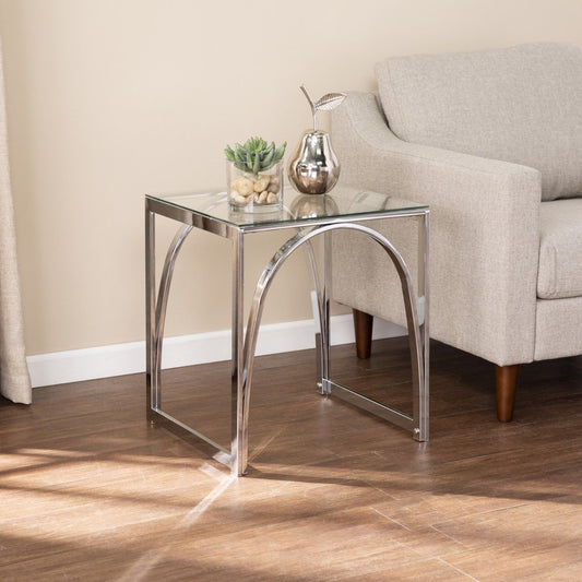 22-inch square end table with chrome metal frame, glass top, and iron accents.