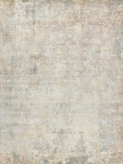 Neutral distressed area rug in cream, beige and gray tones with a textured vintage-look pattern.