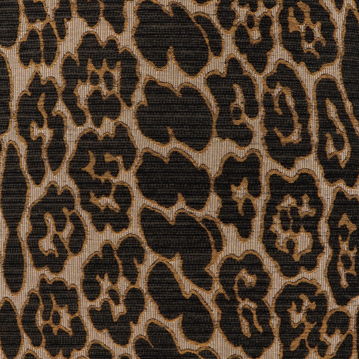 Beige/tan background with black leopard print; woven textured fabric for upholstery or fashion.