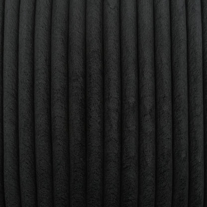 Black pillow with solid jet color and soft, textured surface.