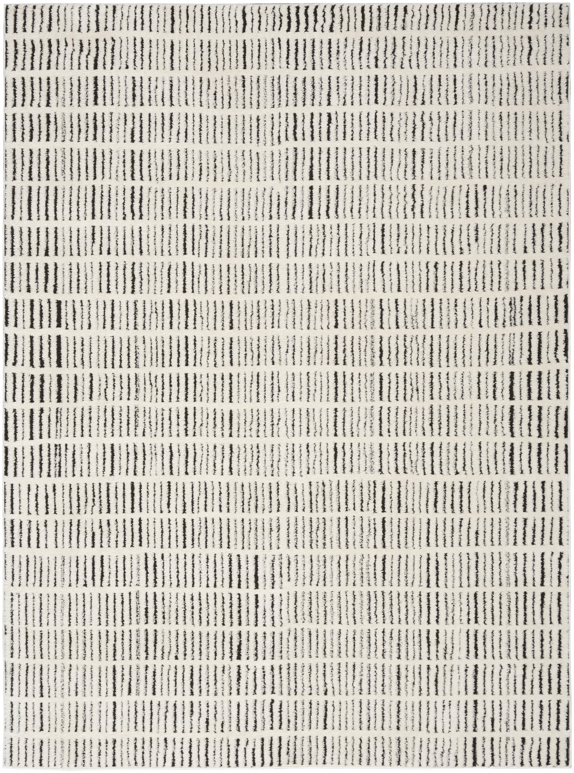 Beige rectangular rug with black dotted vertical stripes in repeated rows; modern geometric design.