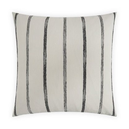 Beige pillow with vertical ebony brush-stroke stripes.