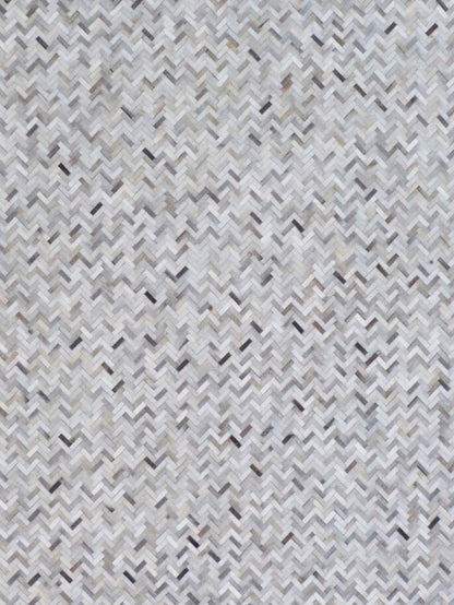 Neutral grey, white and beige mosaic leather rug, indoor hand-stitched with a textured geometric pattern.