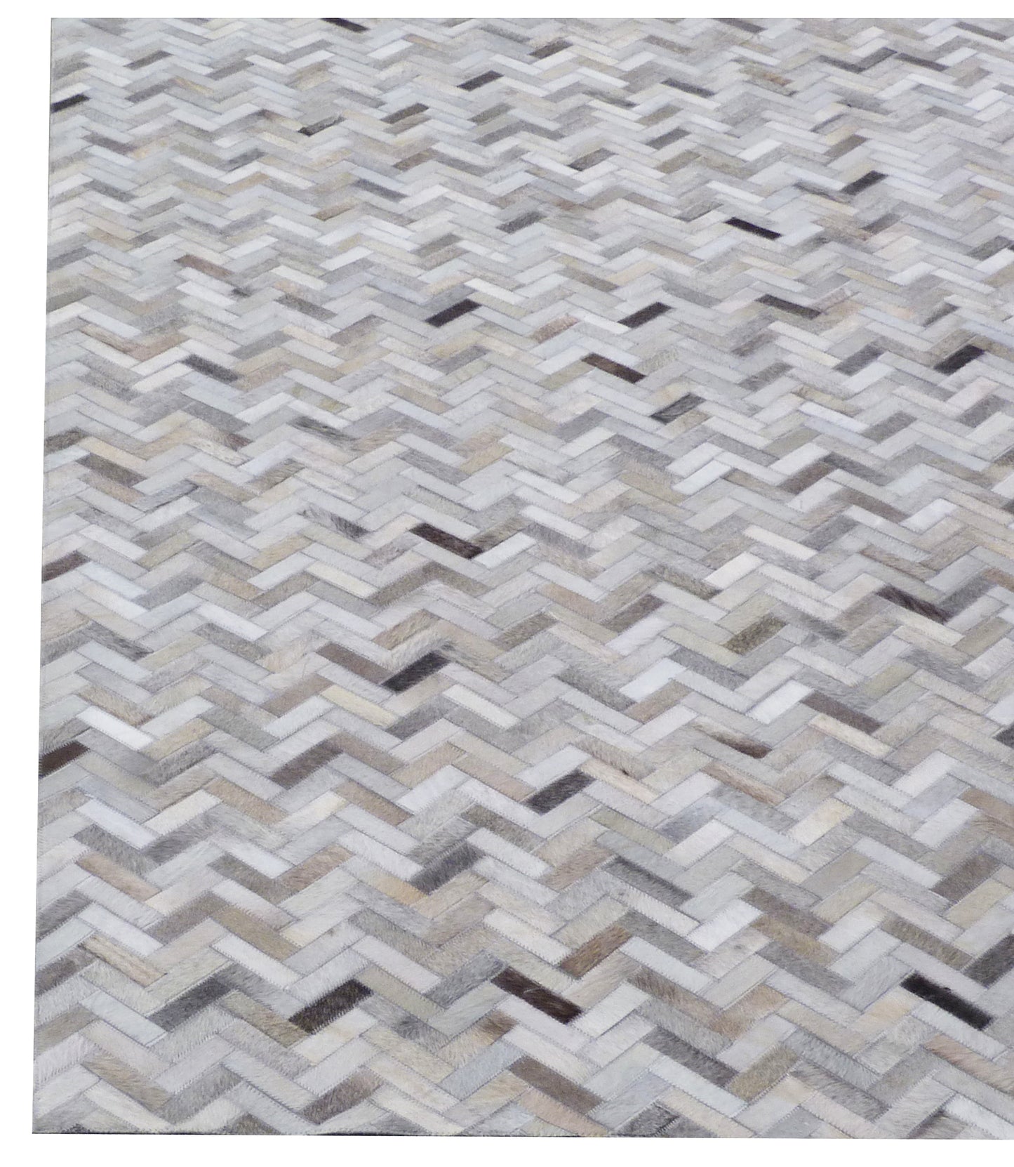 Neutral chevron rug in beige, gray and ivory tones with a modern geometric zigzag pattern.