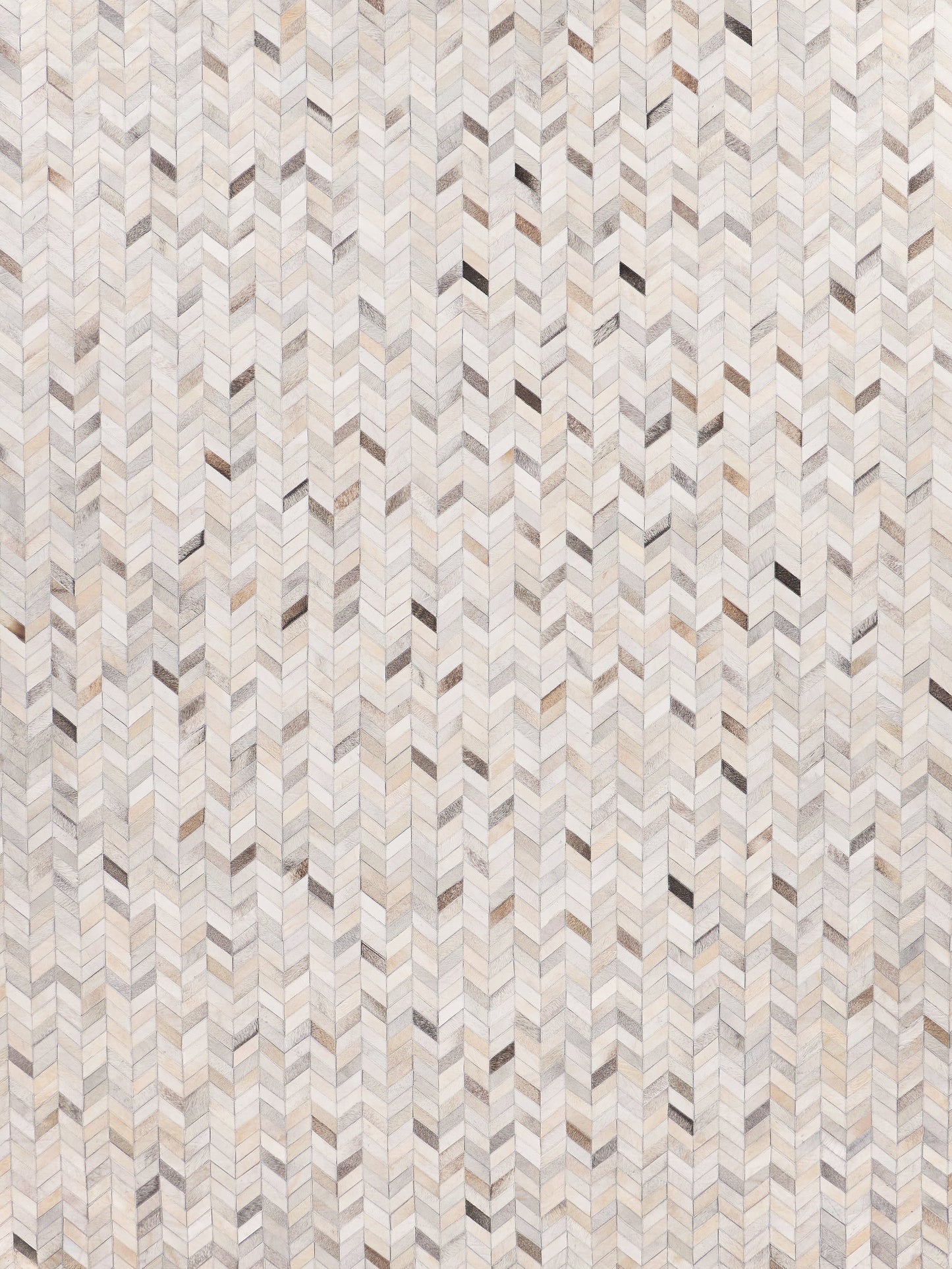 Neutral mosaic leather rug with hand-stitched details in beige, gray and taupe.