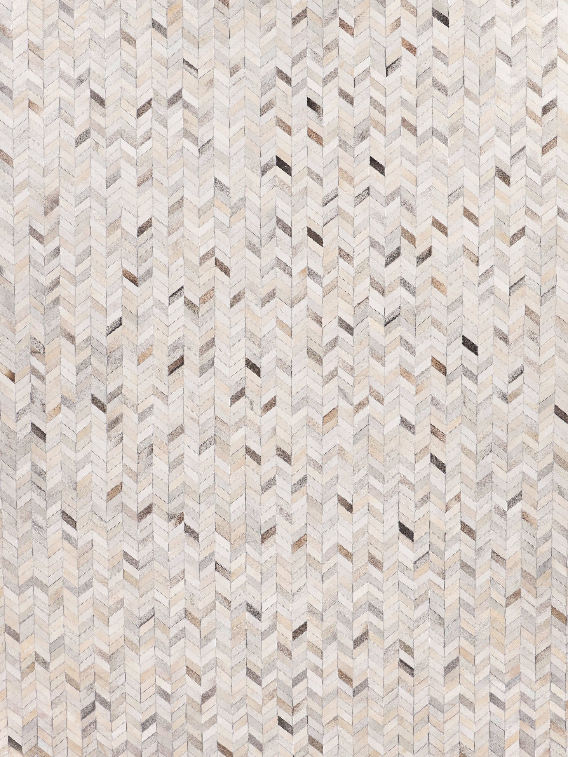 Neutral mosaic leather rug with hand-stitched details in beige, gray and taupe.