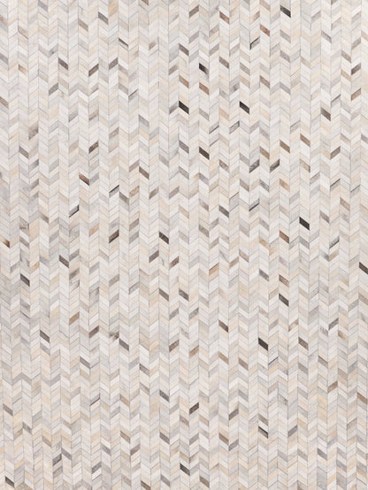 Neutral mosaic leather rug with hand-stitched details in beige, gray and taupe.