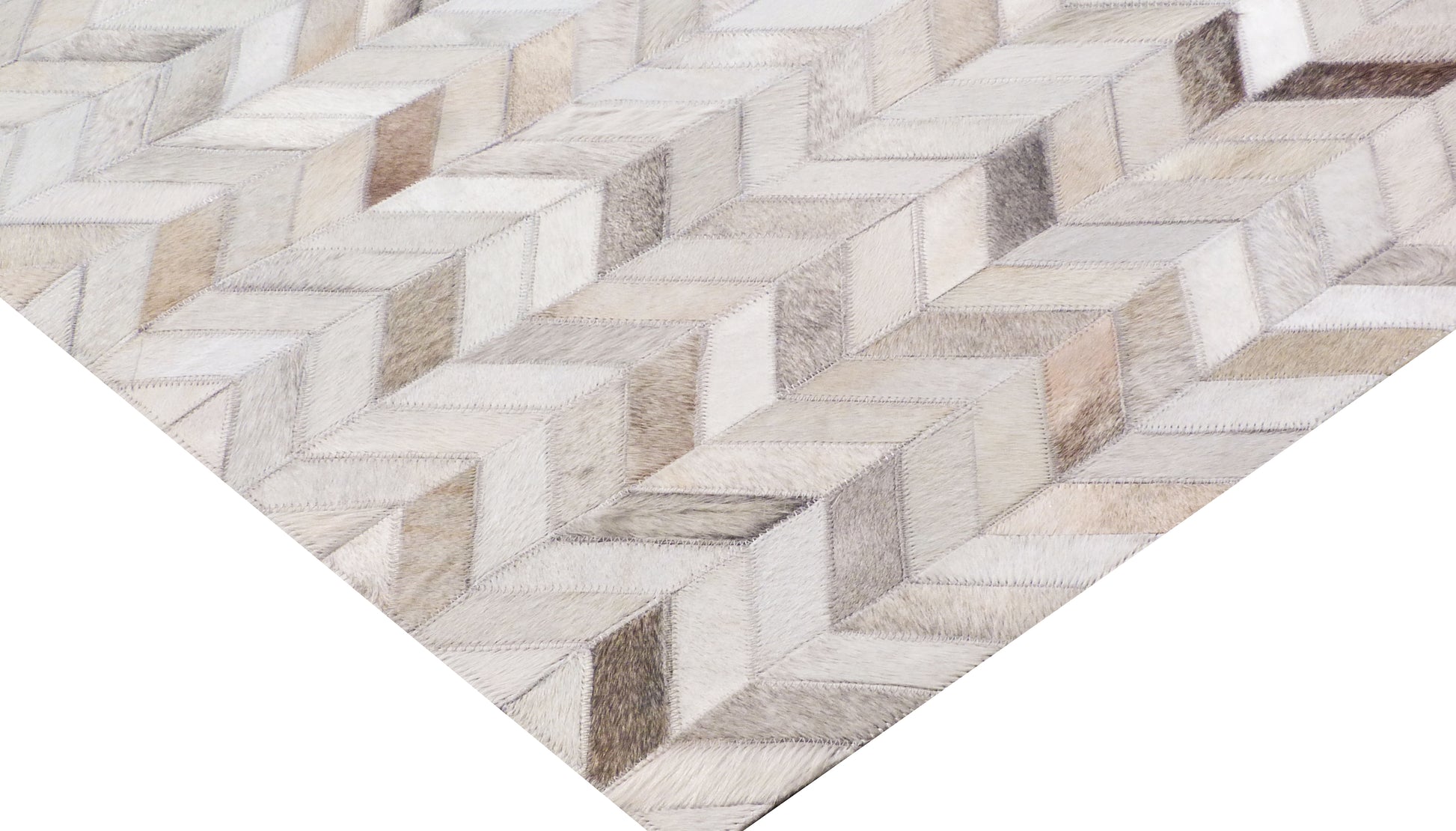 Neutral mosaic leather rug with hand-stitched patchwork in cream, beige & taupe featuring geometric blocks.
