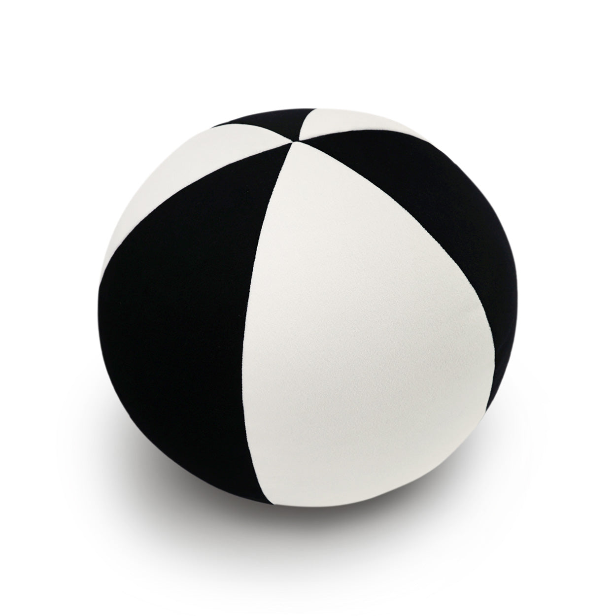 Round 12x12 inch pillow with black color-block design.