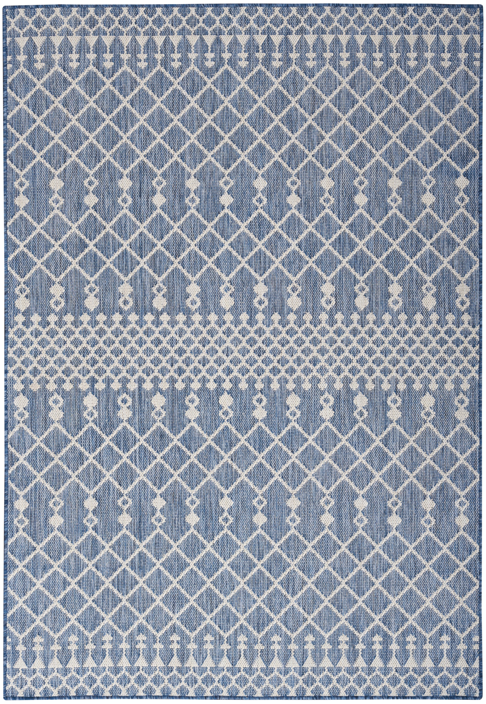 Blue and white woven area rug with diamond lattice patterns and decorative horizontal bands.
