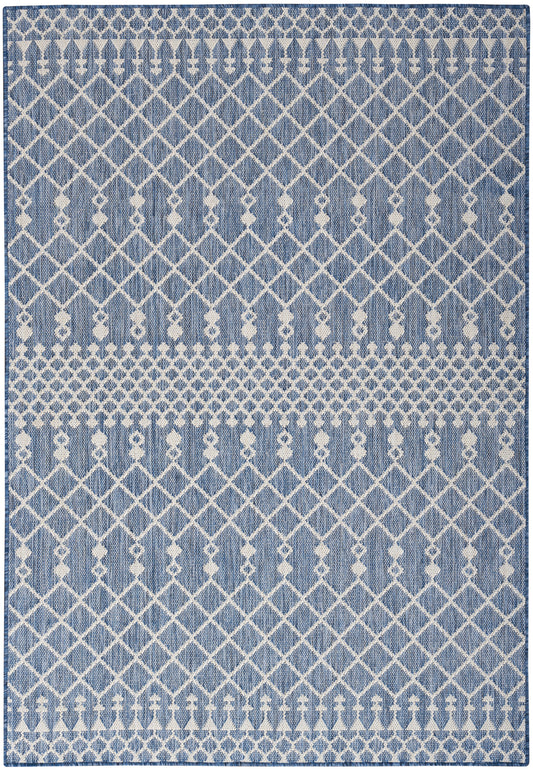 Blue and white woven area rug with diamond lattice patterns and decorative horizontal bands.