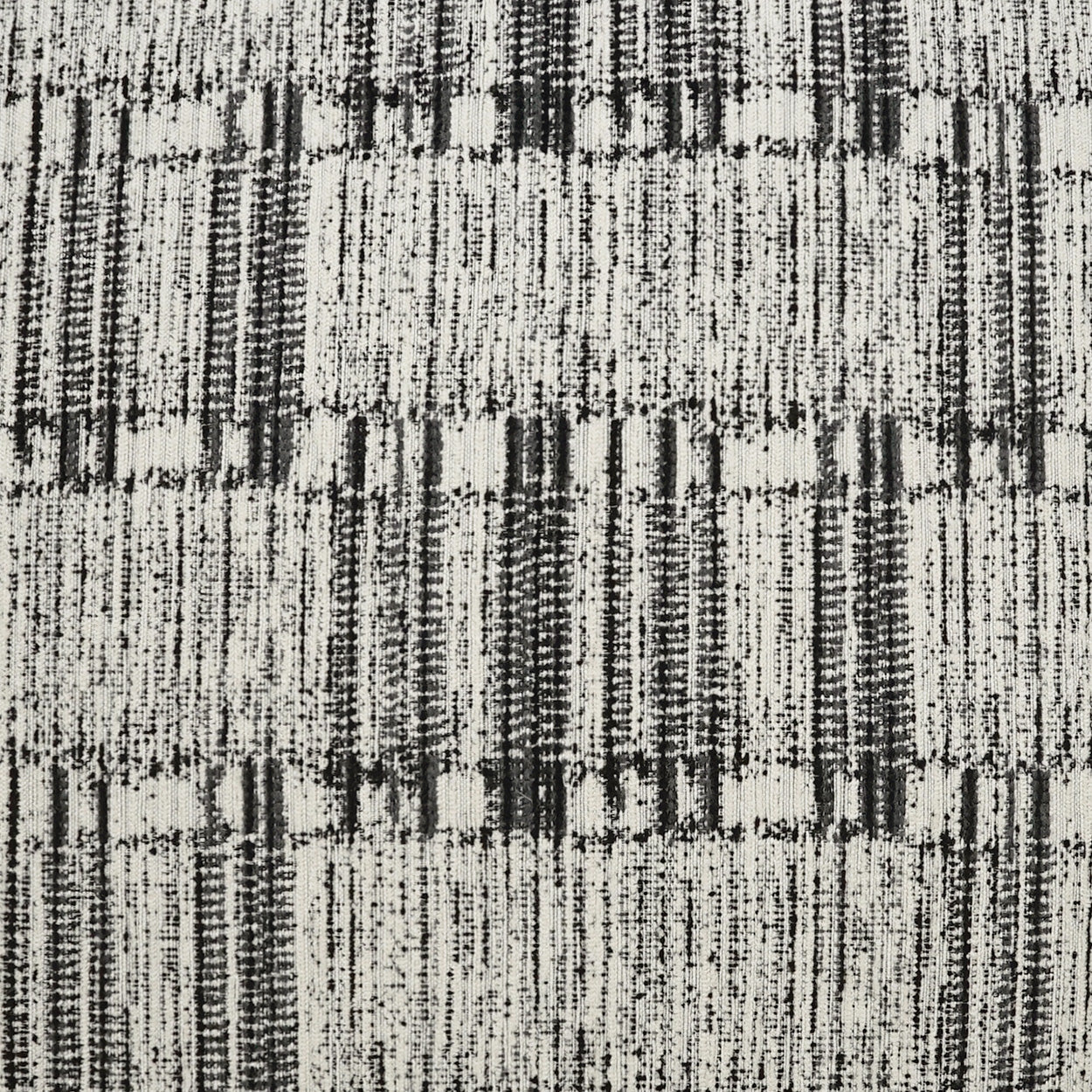 Gray tweed-style fabric with irregular black vertical streaks and a woven textured surface, upholstery material.
