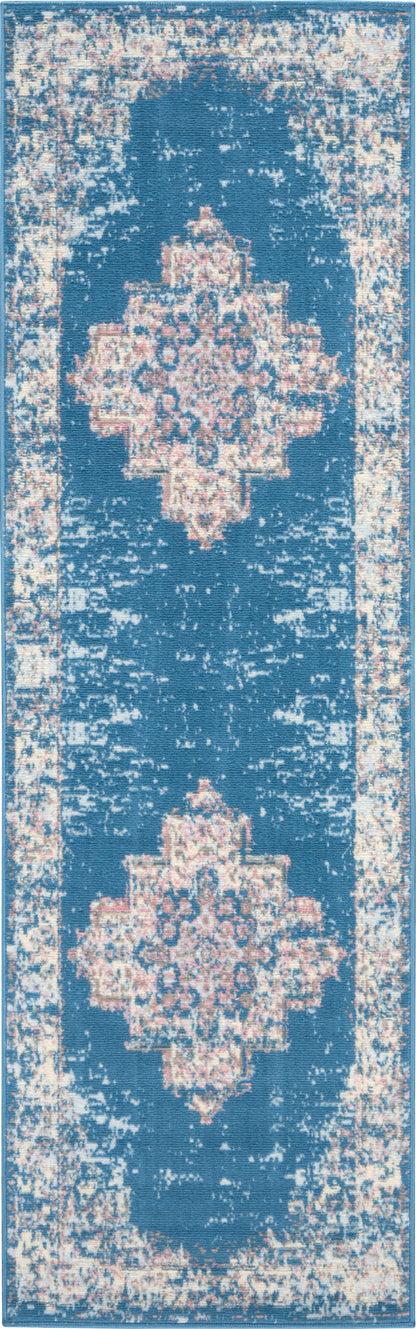 Blue distressed rug runner with cream-pink Moroccan-style medallions and a light border.