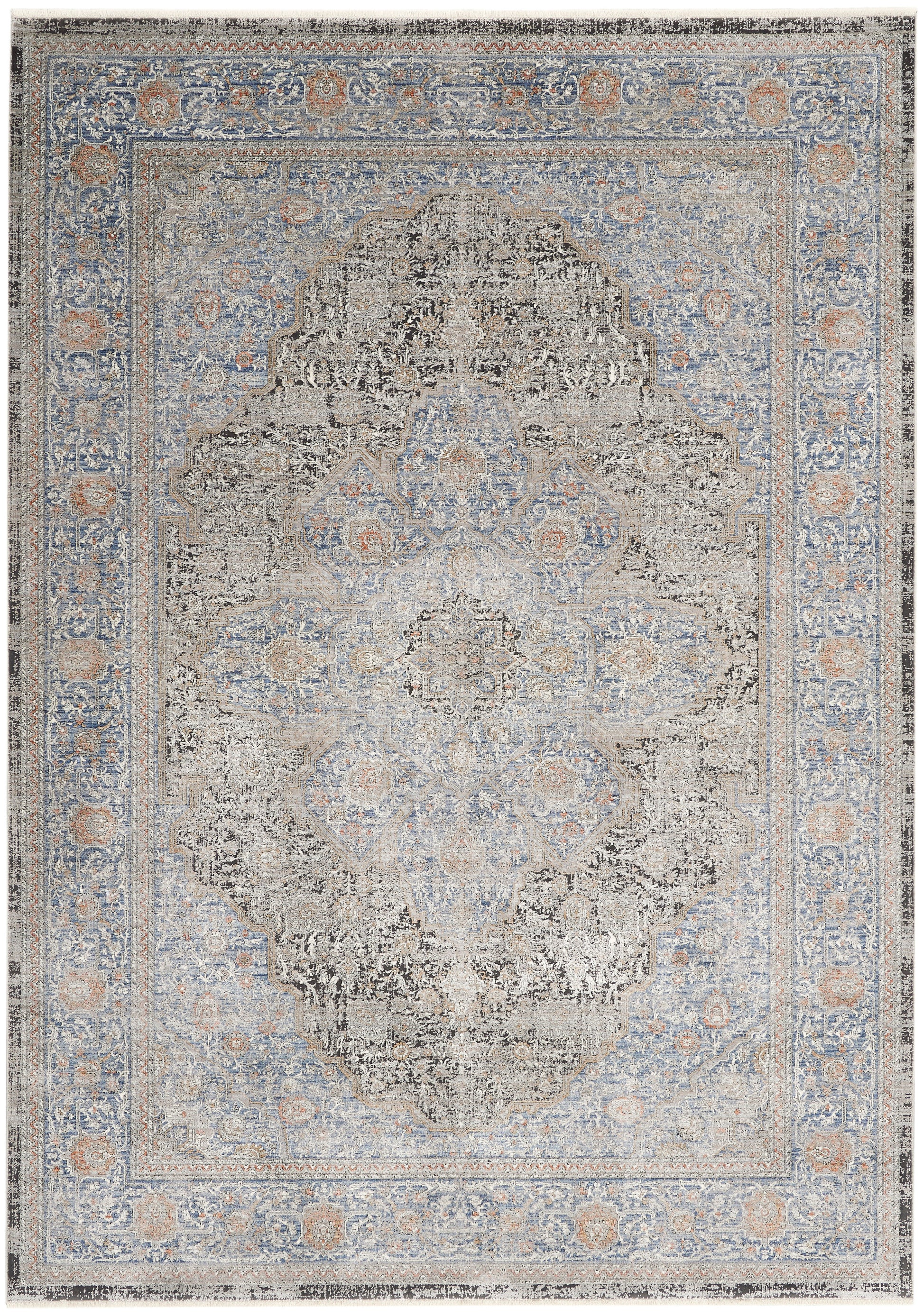 Distressed Persian-style area rug in blue and beige tones with a central medallion and ornate floral border.