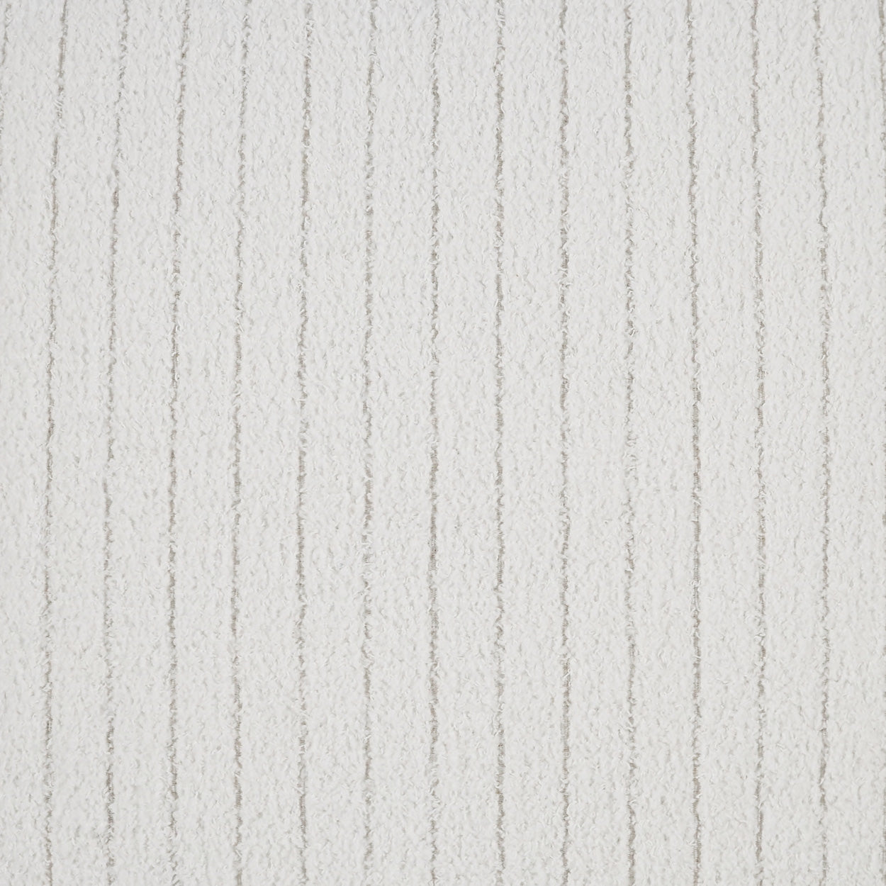Cream ribbed fabric texture with vertical cord-like stripes, soft and plush.