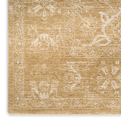 Beige oriental area rug with ivory floral border, distressed vintage pattern and warm gold tones.