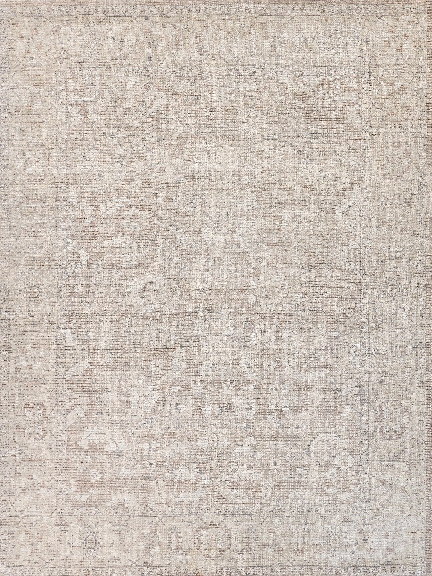 Neutral beige distressed oriental area rug with subtle floral medallion pattern & ornate border.