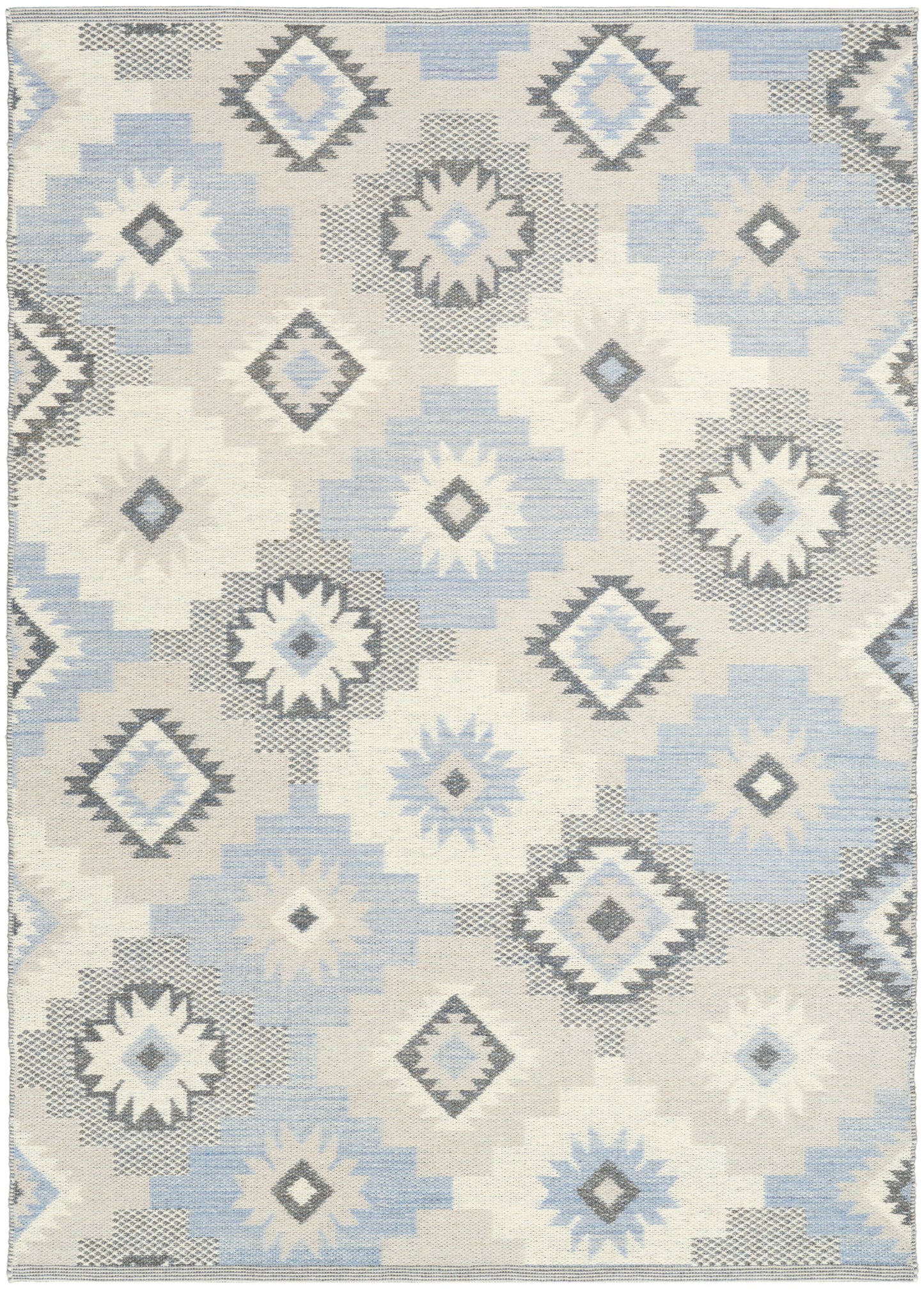 Rectangular woven rug with light blue, ivory and gray diamond motifs in a geometric ikat-inspired pattern.