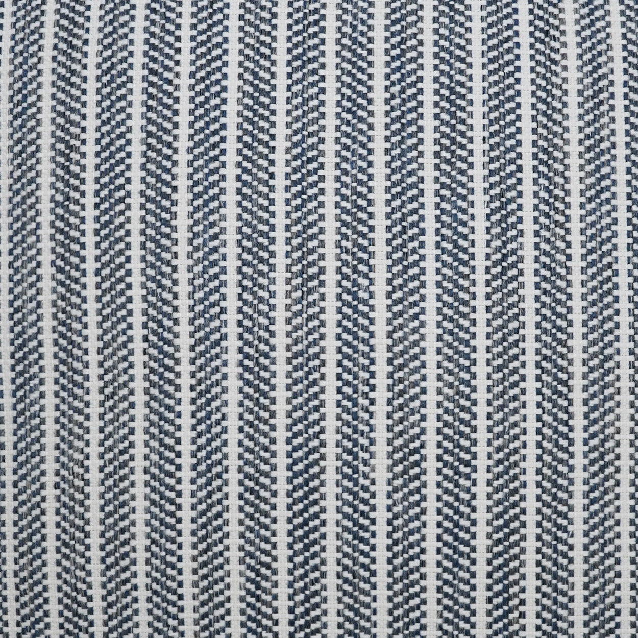 Navy and ivory chevron-striped woven fabric with vertical zigzag pattern; geometric upholstery textile