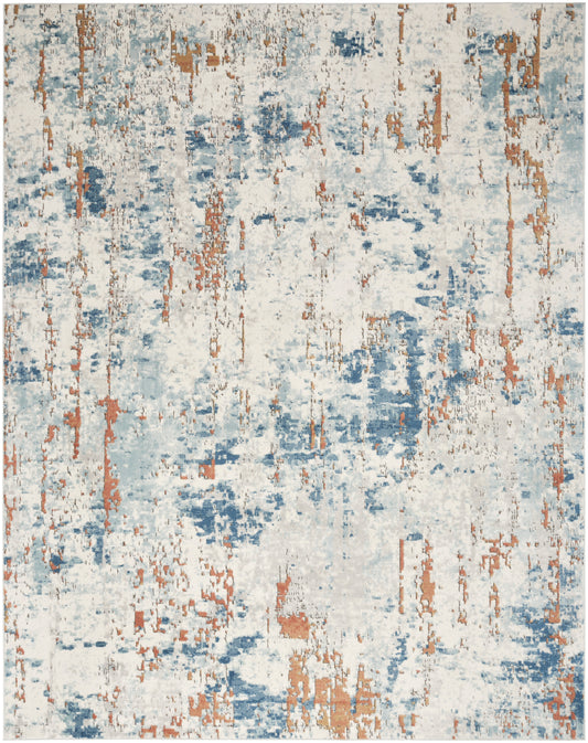 Rectangular abstract rug in blue, cream and rust with a distressed pattern; modern coastal vibe for living spaces.
